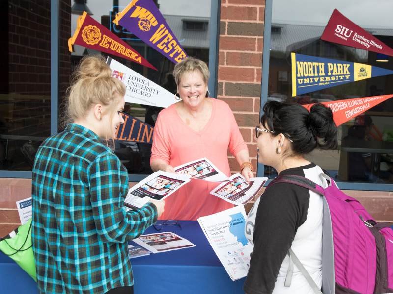 Heartland staff member explaining transfer options.