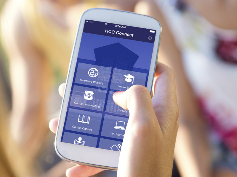 hand holding phone with app displayed